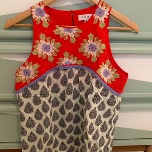 Floral and tropical sleeveless shirt size small.